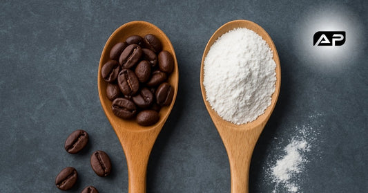 Two wooden spoons on a dark textured surface—one filled with roasted coffee beans, the other with white caffeine powder—visually contrasting natural vs synthetic caffeine.