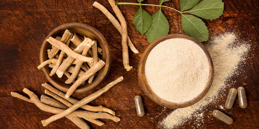 Ashwagandha next to ashwagandha powder on a wooden table