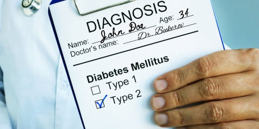 Doctor holding a diagnosis sheet reading "diabetes mellitus type 2"