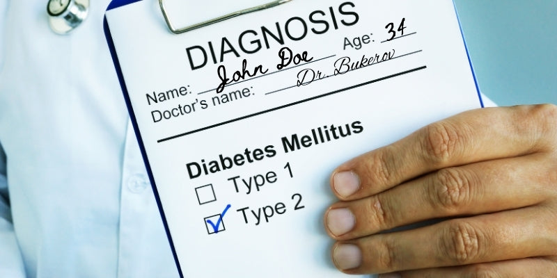 Doctor holding a diagnosis sheet reading "diabetes mellitus type 2"